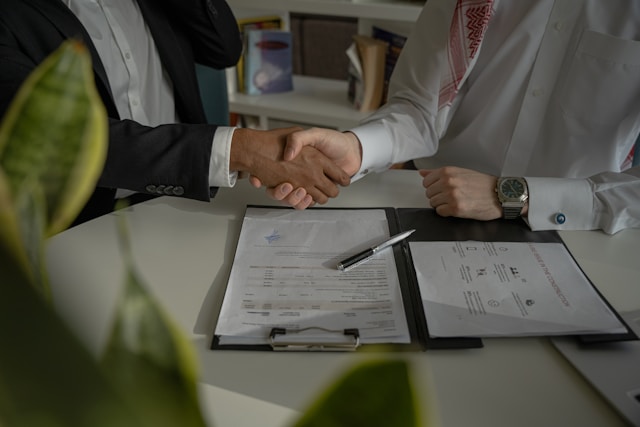 KDST agent finalizing a land agreement with a client